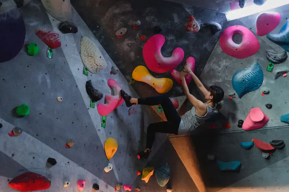 Wide view of the bouldering walls and climbing mats during open hours