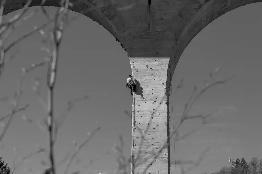 Vertical slab climbing wall with delicate holds